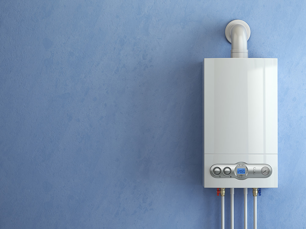 gas tankless water heater on a blue wall